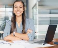 Woman smiling laptop.jpg